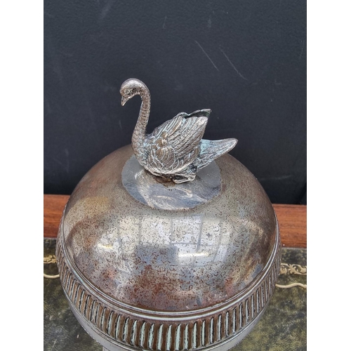 1367 - An electroplated egg coddler, 23cm high. 