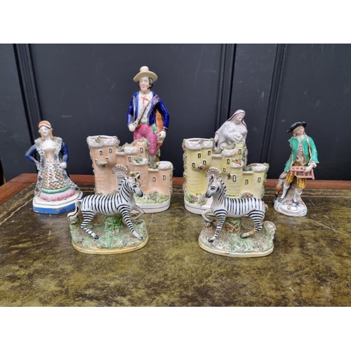 1371 - A group of Victorian Staffordshire pottery and other figures. (8)