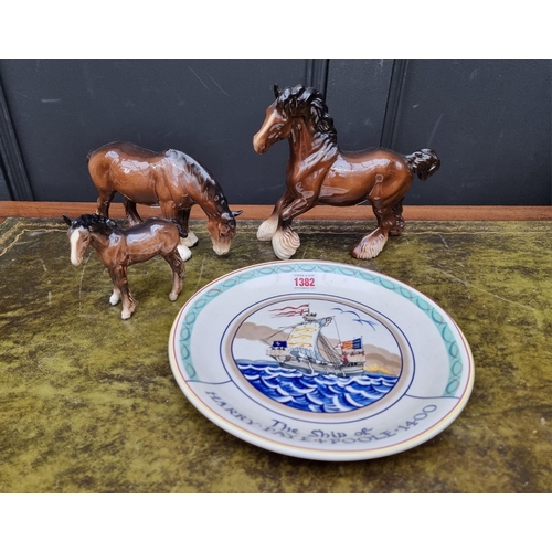 1382 - A Poole pottery commemorative plate, 27.5cm diameter; together with three Beswick horses. (4)... 