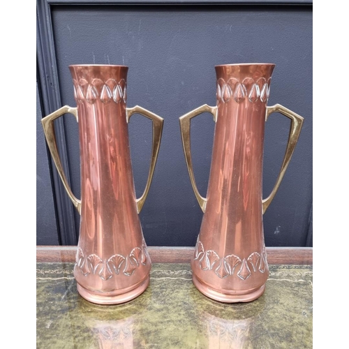 1386 - A pair of WMF Secessionist copper and brass twin handled vases, 30cm high. 