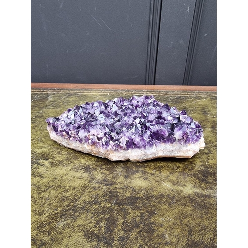 1394 - Natural History: an amethyst crystal specimen, 23cm wide.