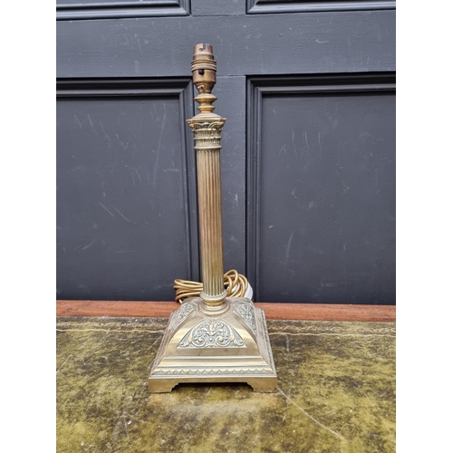 1407 - An old brass Corinthian column table lamp, total height 43cm.