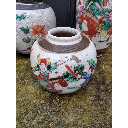 1413 - A group of Chinese famille rose crackle glaze vases and jars, largest 30cm high. (5)... 