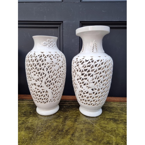 1417 - Two similar Chinese blanc de chine reticulated vase form lamp bases, largest 35.5cm high. ... 