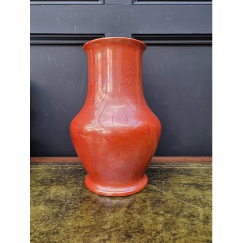 1427 - A Ruskin pottery orange lustre vase, dated 1913, 32.5cm high. 