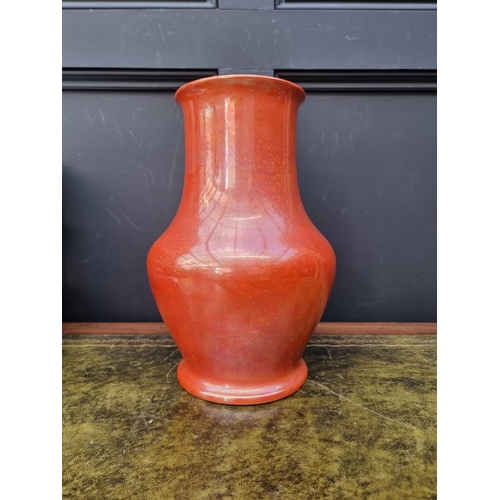 1427 - A Ruskin pottery orange lustre vase, dated 1913, 32.5cm high. 