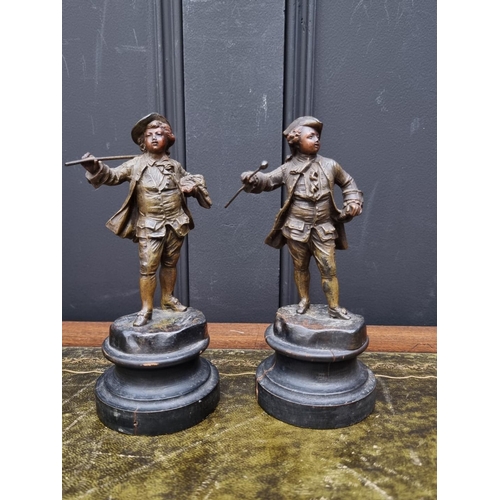 1430 - A small pair of spelter figures, on ebonized socle, 19.5cm high.