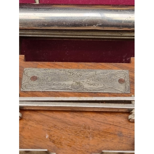 1432 - A vintage French walnut and nickel plated cigarette rolling machine, in fitted box. ... 