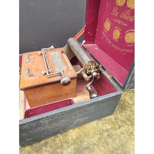 1432 - A vintage French walnut and nickel plated cigarette rolling machine, in fitted box. ... 