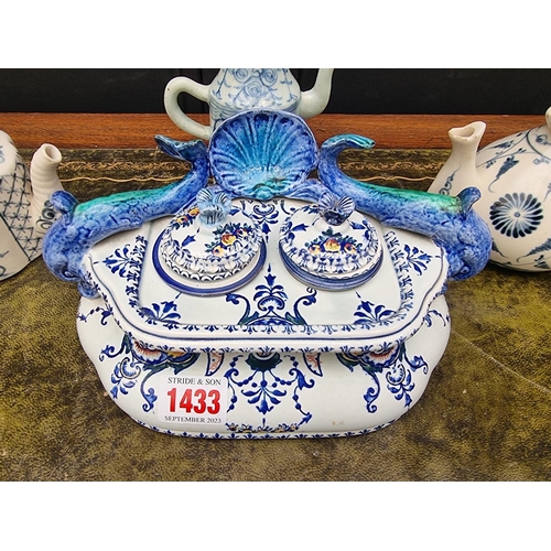 1433 - A Gien faience desk stand, 21cm wide; together with a small antique Chinese blue and white wine pot ... 