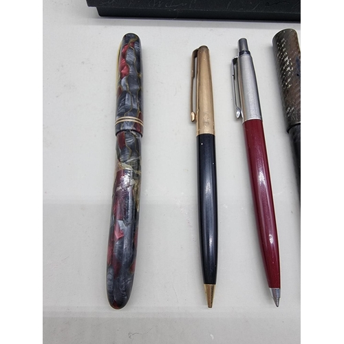 1460 - A small collection of vintage pens, two with 14ct nibs.