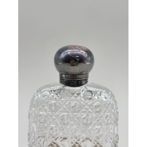 1461 - An antique electroplate mounted cut glass hip flask, by James Dixon & Sons, 14cm high.... 