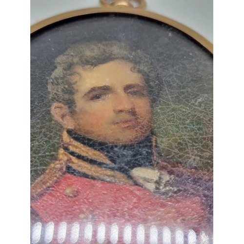 1465 - British School, early 19th century, bust length portrait miniature of a officer in a scarlet tu... 