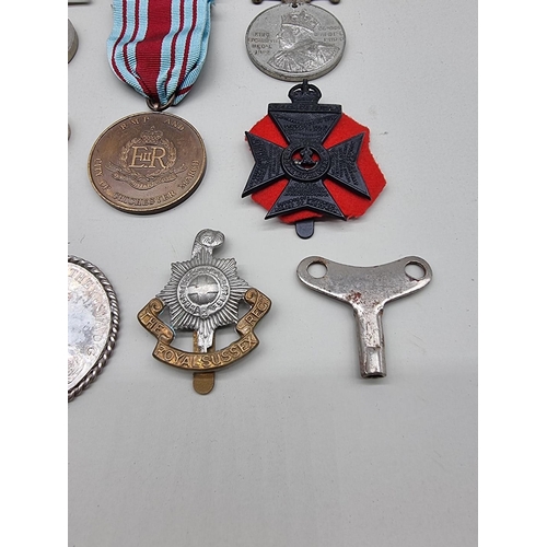 1473 - Medals: a collection of badges, buttons and related, to include World War II medals. ... 