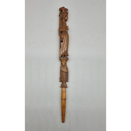 1485 - A good Eastern carved wood pointer, 37cm long.