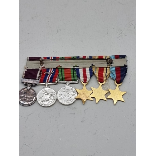 1487 - Medals: a small quantity of miniature medals. 