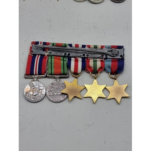 1487 - Medals: a small quantity of miniature medals. 