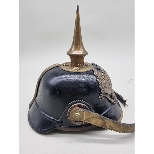 1517 - A Prussian infantry NCO's pickelhaube, with eagle helmet plate and brown leather liner.... 