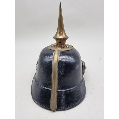 1517 - A Prussian infantry NCO's pickelhaube, with eagle helmet plate and brown leather liner.... 