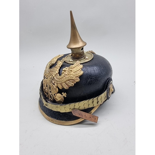 1518 - A Prussian infantry officer's pickelhaube, with eagle helmet plate and brown leather liner.... 