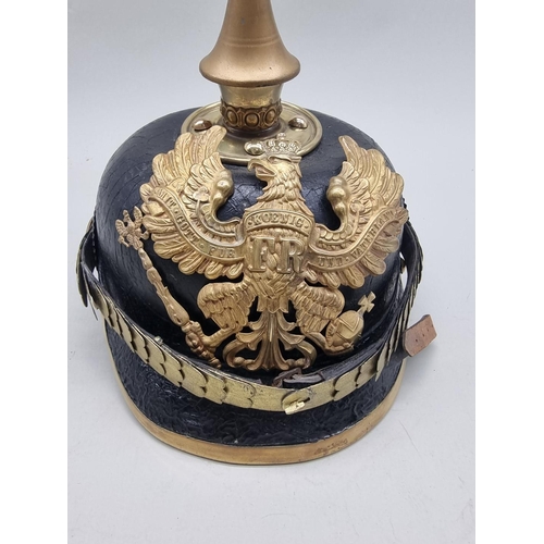 1518 - A Prussian infantry officer's pickelhaube, with eagle helmet plate and brown leather liner.... 