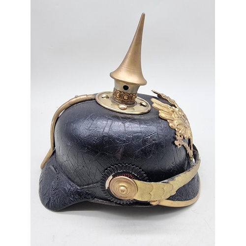 1518 - A Prussian infantry officer's pickelhaube, with eagle helmet plate and brown leather liner.... 