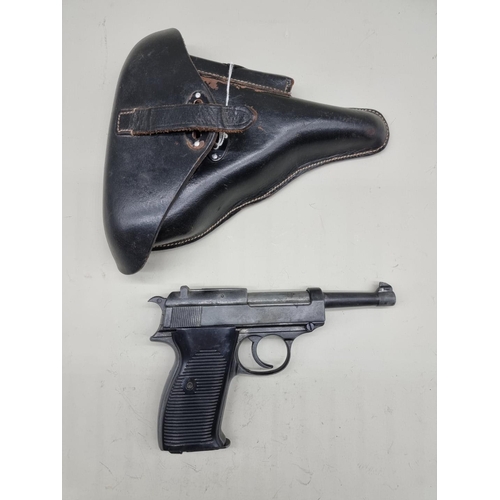 1520 - A BBM ME 38P 8mm top venting blank firing pistol, and leather holster.(This lot is offered for the p... 