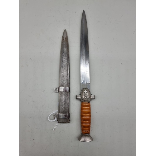 1534 - A German Third Reich DRK Red Cross leaders dress dagger and sheath, (chips to orange grip).... 