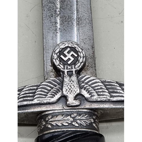 1538 - A German Third Reich first pattern Reichsbahn Railway dagger and steel sheath, the blade engraved 'A... 