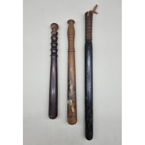 1539 - Three various truncheons, comprising: a Victorian painted wood Police example, by 'Parker 233 Holbor... 