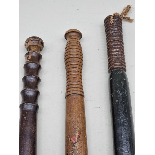 1539 - Three various truncheons, comprising: a Victorian painted wood Police example, by 'Parker 233 Holbor... 