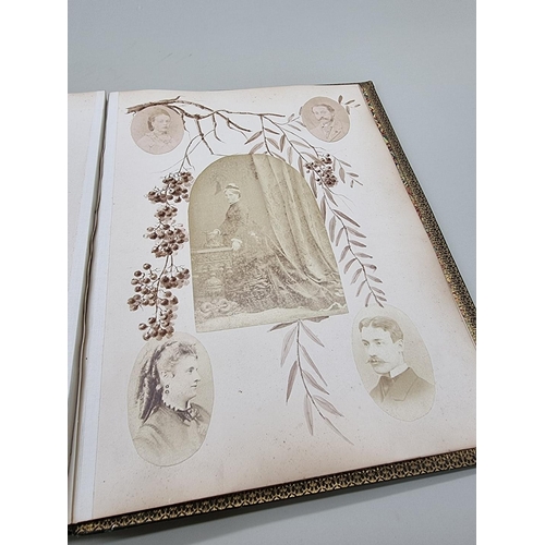 530 - VICTORIAN PHOTOGRAPH ALBUM: 19thc album of family portrait photographs, artistically arranged o... 