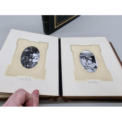 530 - VICTORIAN PHOTOGRAPH ALBUM: 19thc album of family portrait photographs, artistically arranged o... 