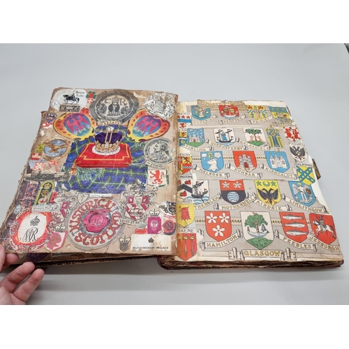 538 - HERALDRY: SCRAP ALBUM: 19thc large 4to scrap album, brown full morocco, upper board gilt letter... 