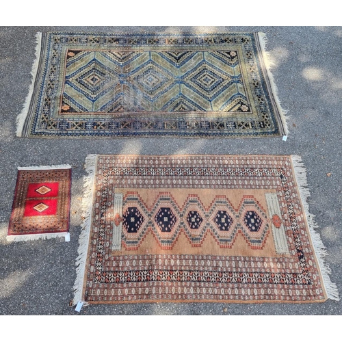 1131 - A Persian rug, having three central medallions, with geometric design, 265 x 150cm; together with a ... 