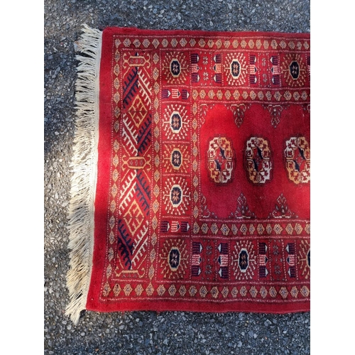 1132 - A tribal rug, 123 x 80cm; together with three other rugs.