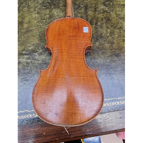 1501 - An antique Continental violin, with 14in two piece back. 