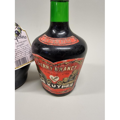 5 - Two old 24 fl.oz. bottles of De Kuyper Cherry Brandy, 1960s bottlings; together with a 70cl bottle o... 