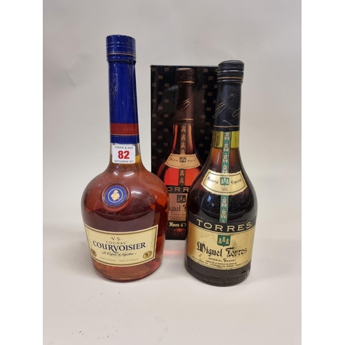 82 - Two bottles of Brandy, comprising: a 1 litre Courvoisier VS Cognac; and a 70cl Miguel Torres Hors d'... 