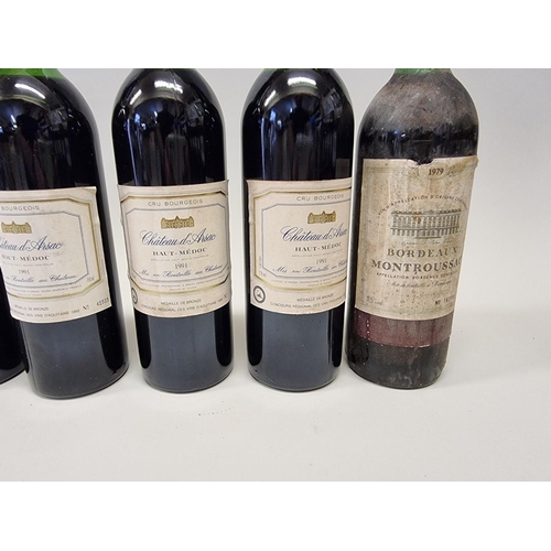 94 - Nine 75cl bottles of red Bordeaux, to include: five Chateau d'Arsac, Haut-Medoc, 1991; and two Mouto... 