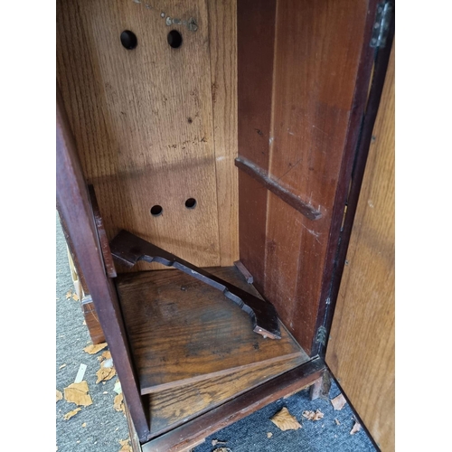 1075 - An Edwardian mahogany bedside cupboard, 41cm wide. 