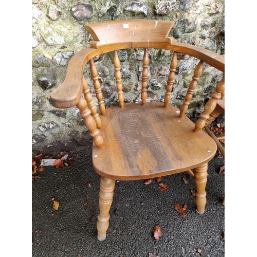 1106 - A pair of beech and elm smokers bow chairs.Ensuite with the previous lot.