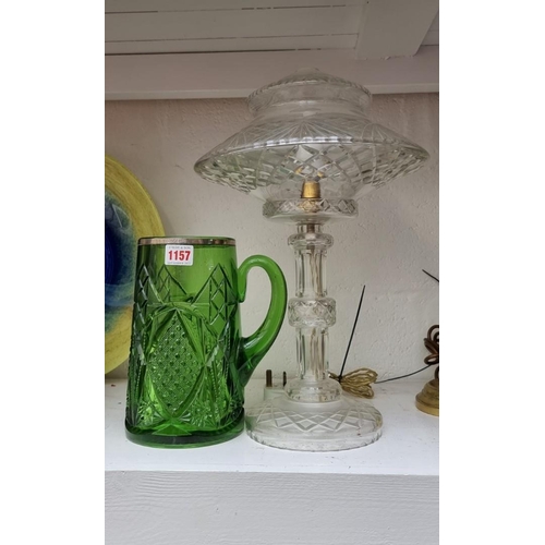 1157 - A cut glass table lamp, 43cm high; together with a cut green glass jug, 22.5cm high. (2)... 