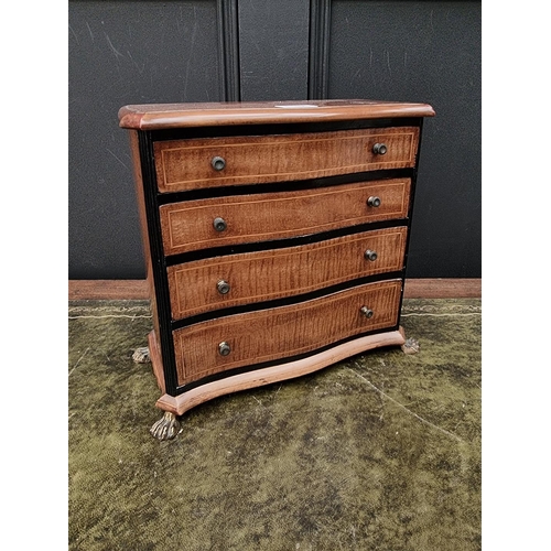 1165 - An early 20th century mahogany, ebonized and line inlaid miniature chest of drawers, 27.5cm hig... 