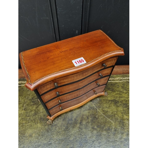 1165 - An early 20th century mahogany, ebonized and line inlaid miniature chest of drawers, 27.5cm hig... 