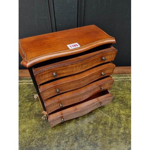 1165 - An early 20th century mahogany, ebonized and line inlaid miniature chest of drawers, 27.5cm hig... 