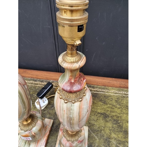 1181 - A pair of onyx and brass table lamps, total height 43.5cm. 