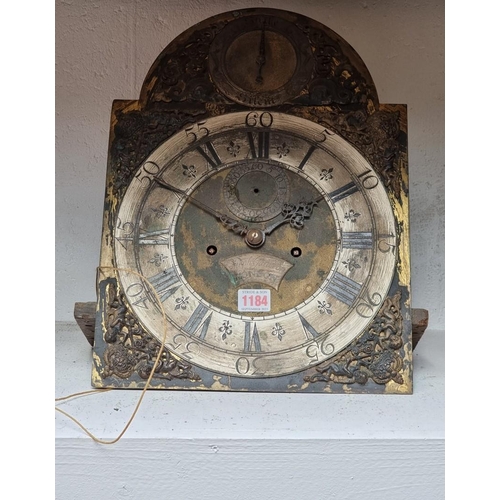 1184 - A 18th century 12in brass arched longcase clock dial and movement, inscribed 'Steph Ganeron, London'... 