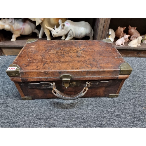 1341 - An old tan leather and brass bound shotgun cartridge case, 47.5cm wide.