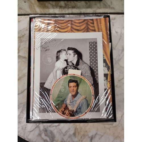 1352 - A collection of reproduction Elvis Presley ephemera and memorabilia, boxed.... 